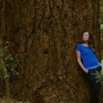 Cascadia Wildlands Executive Director Kate Ritley strikes a pose in the Elliott Rainforest, near Eugene, Oregon.